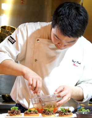 Chan's Chef Park assembles bulgogi sliders.JPG